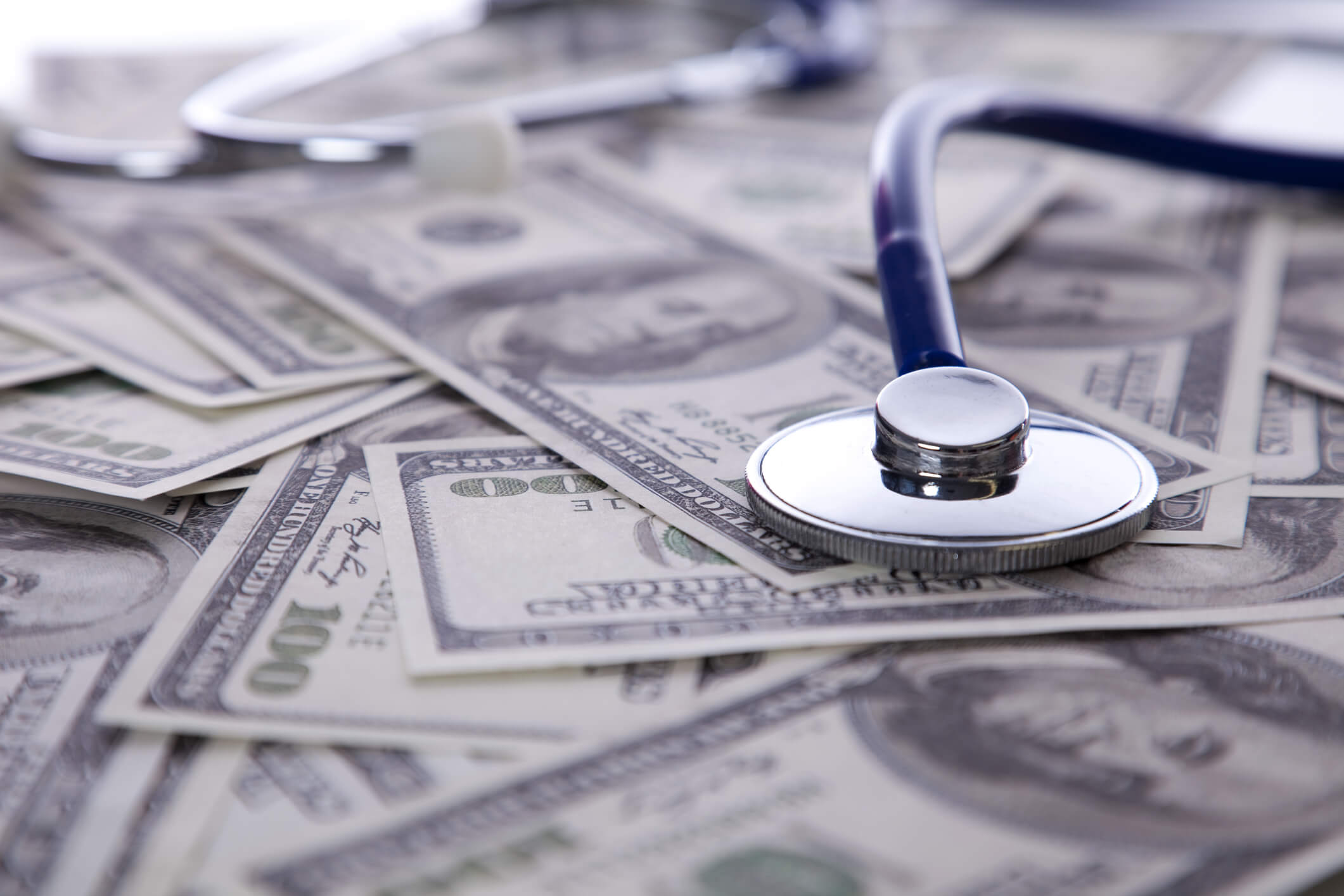 The price of good healthcare service. High cost for a good healthcare service (selective focus)