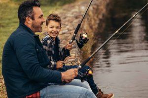 Man and son fishing