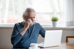senior scam on laptop