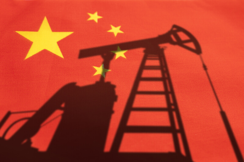 chinese flag and mining rig, rare earth mineral mining