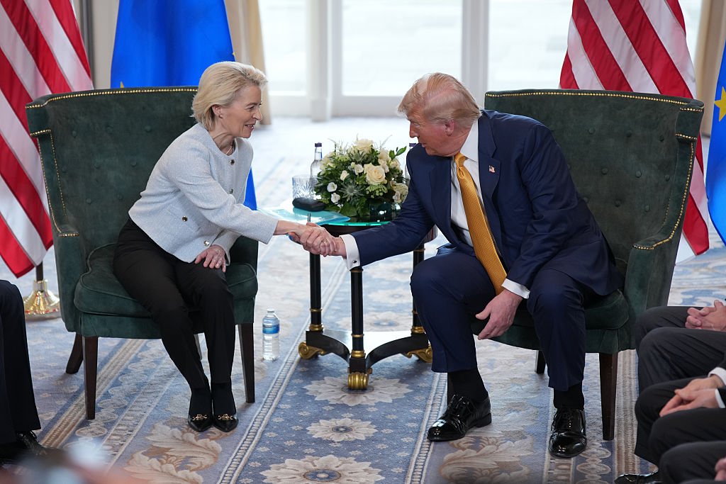 TURNBERRY, SCOTLAND - JULY 27: President of the European Commission Ursula von der Leyen shakes hands with U.S. President Donald Trump during a meeting at Trump Turnberry golf club on July 27, 2025 in Turnberry, Scotland. U.S. President Donald Trump is visiting his Trump Turnberry golf course, as well as Trump International Golf Links in Aberdeenshire, during a brief visit to Scotland from July 25 to 29. (Photo by Andrew Harnik/Getty Images)