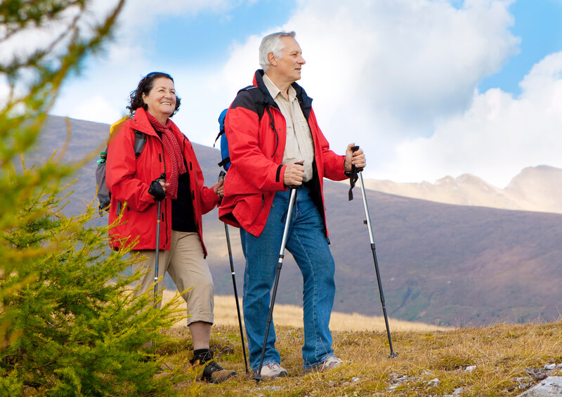 seniors traveling in the united states, hiking a trail