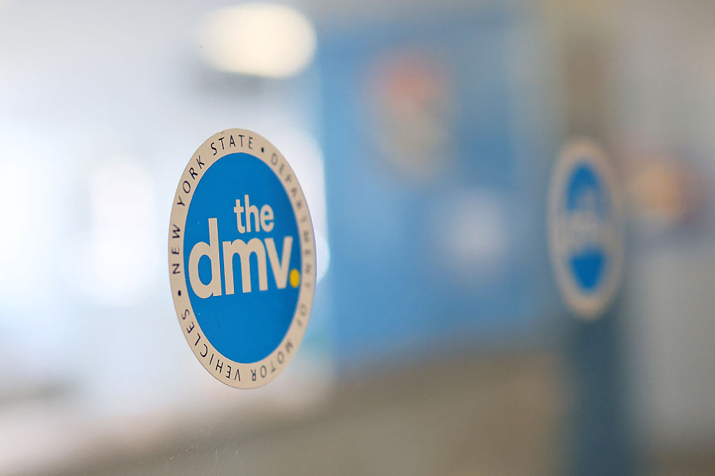 DMV logo on building, giving out illegal driver's licenses