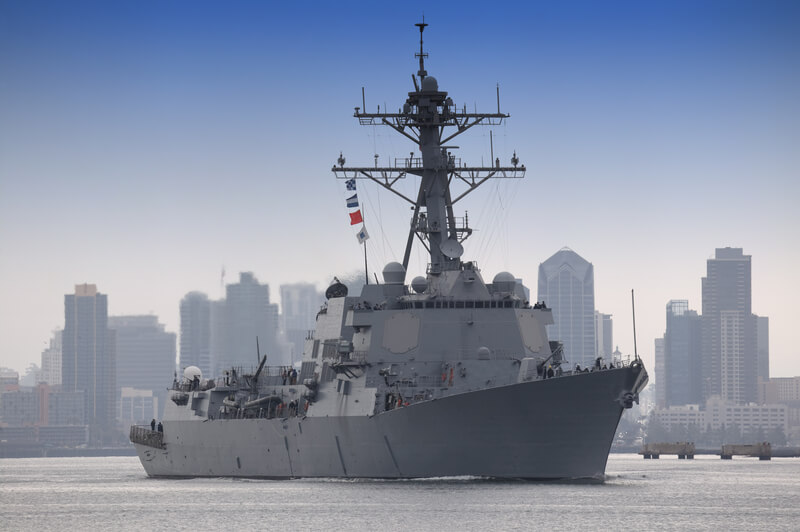 US Navy Destroyer. Arleigh Burke-class guided missile destroyer leaving port.