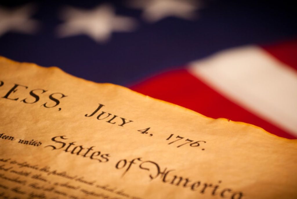 Declaration of Independence on flag background. United States Declaration of Independence on a Betsy Ross flag background