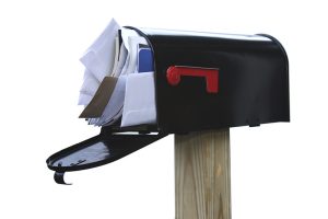 ANOC, Annual Notice of Change. Mail Box stuffed full of junk mail, spam, bills and other unwanted correspondence.