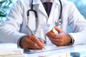 prescription drugs, doctor writing