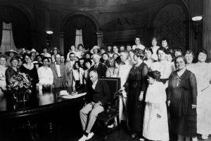 Image of the signing of the 19th amendment of the constitution