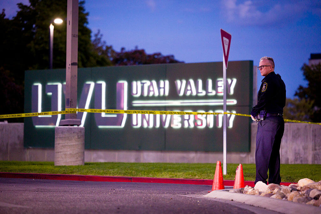 A police officer stands in front of Utah Valley University following the fatal shooting of political activist Charlie Kirk during an event at the campus on September 12, 2025 in Orem, Utah.