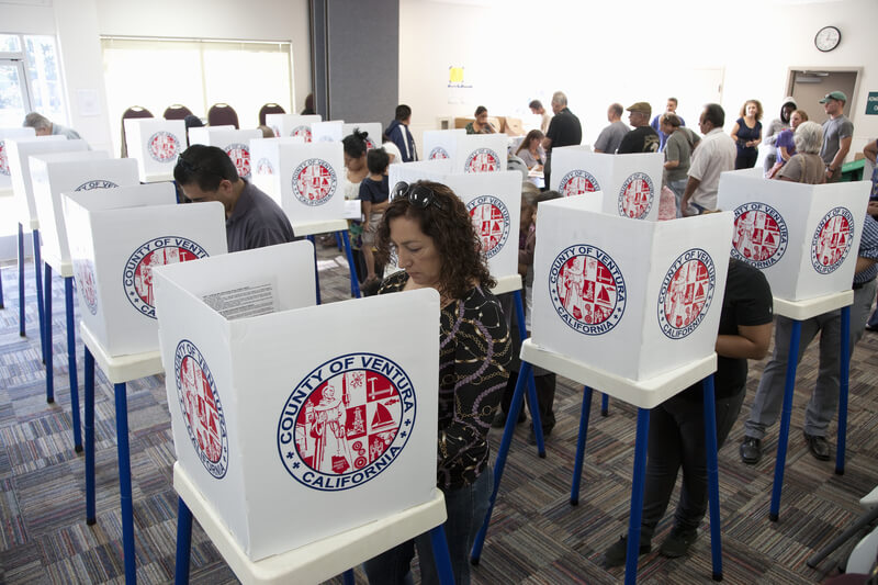 Voters at polling station in 2012. Voters in polling station voting in 2012 Presidential Election