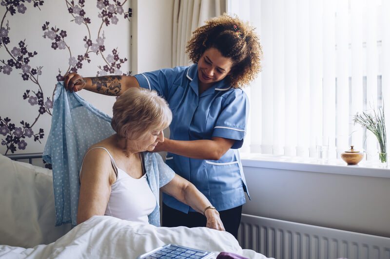 home care doctor with senior