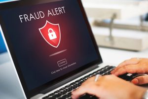 inheritance scam fraud, laptop