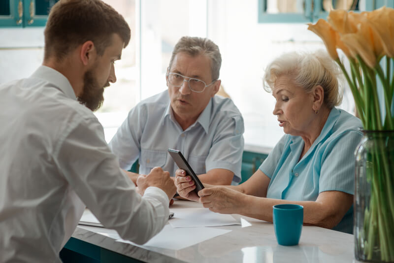 older couple speaking to agent; medicare