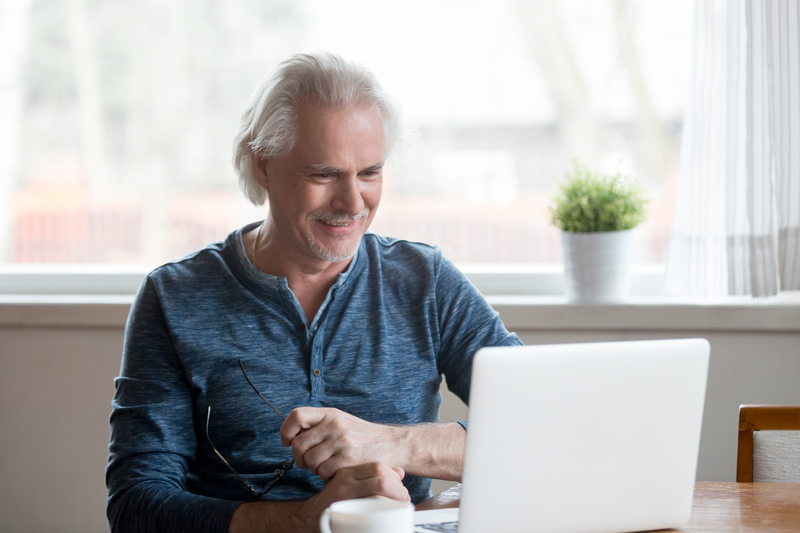 older person on computer