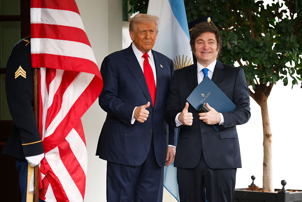 WASHINGTON, DC - OCTOBER 14: U.S. President Donald Trump (L) greets President of Argentina Javier Milei as he arrives at the West Wing of the White House on October 14, 2025 in Washington, DC. Trump is hosting Milei for a working lunch days after the U.S. Treasury finalized a $20 billion currency swap framework with Argentina in an effort to help stabilize its economy. (Photo by Kevin Dietsch/Getty Images)
