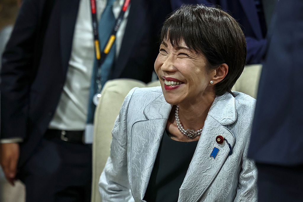 Japan's Prime Minister Sanae Takaichi reacts ahead of the G7++ meeting at the G20 Leaders' Summit at the Nasrec Expo Centre on November 22, 2025 in Johannesburg, South Africa ahead of the G20 Summit.