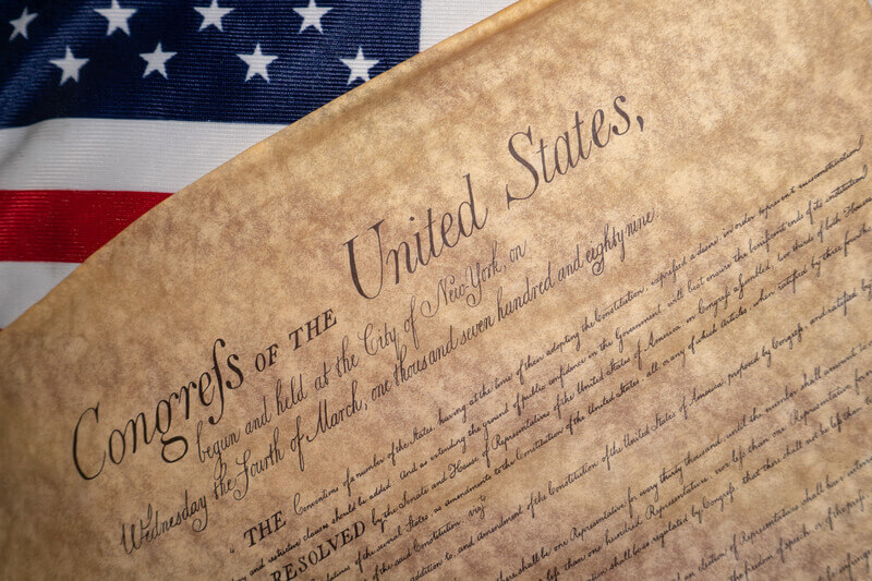 Bill of rights United states vintage document on usa flag background. Bill of rights United states vintage document detail close up