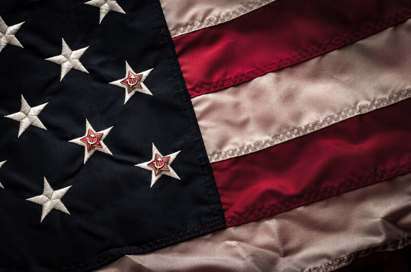 Soviet star on top of the american flag Star and Stripes symbolizing Russia`s involvement in influencing the election in the United States of America.