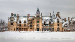 the Biltmore House in Asheville, North Carolina, pictured during a snowy winter day.