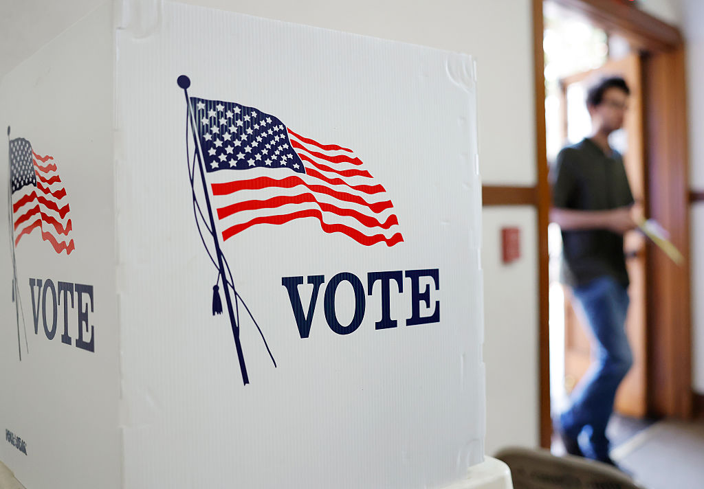 PASADENA, CALIFORNIA - NOVEMBER 04: A person enters a polling station to vote at First United Methodist Church on November 04, 2025 in Pasadena, California. California voters are deciding whether to approve Proposition 50, a measure that would replace the state’s current congressional district map with new, legislature-drawn lines from 2026 through 2030. The proposition was put forward as a response to Republican-controlled states redrawing their own maps to create an electoral advantage in the 2026 midterms. (Photo by Mario Tama/Getty Images)