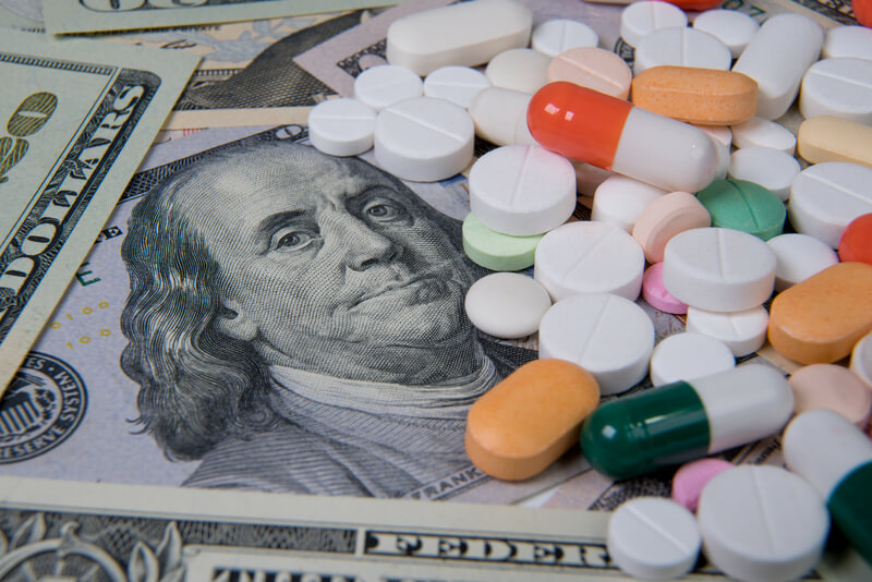 Various medicines on the US dollar. The rising cost of health care.