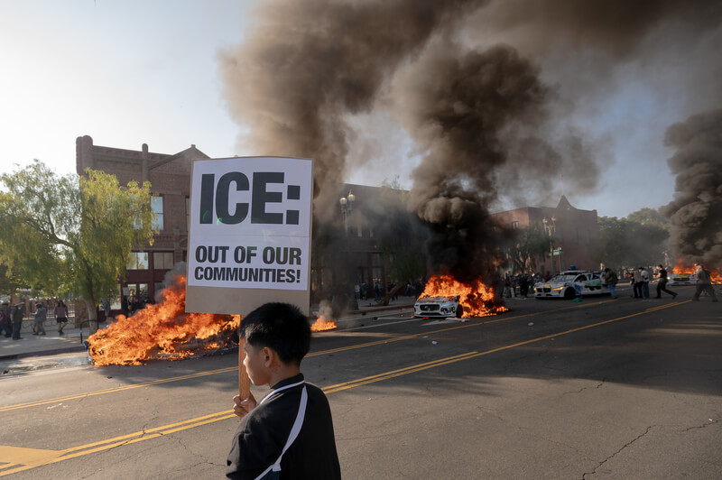 Autonomous electric cars were burned during anti ICE protest in downtown LA. Los Angeles, USA, June 8, 2025 Autonomous electric cars were burned during a downtown demonstration against expanded ICE operations and in support of immigrant rights