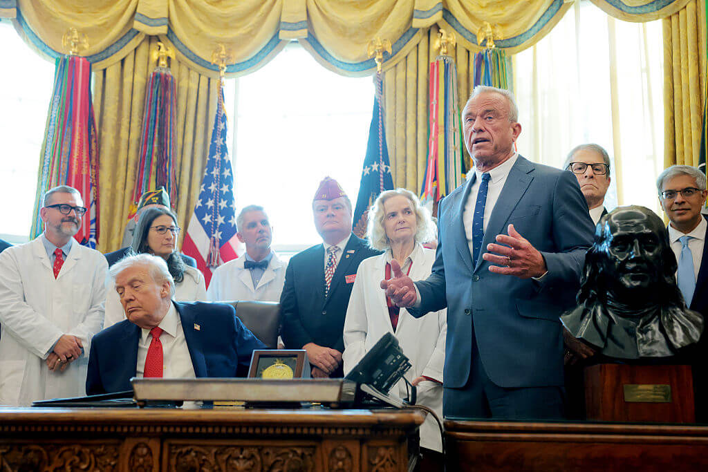 U.S. Health and Human Services Secretary Robert F. Kennedy Jr. speaks alongside U.S. President Donald Trump during an event for an executive order in the Oval Office of the White House on December 18, 2025 in Washington, DC.