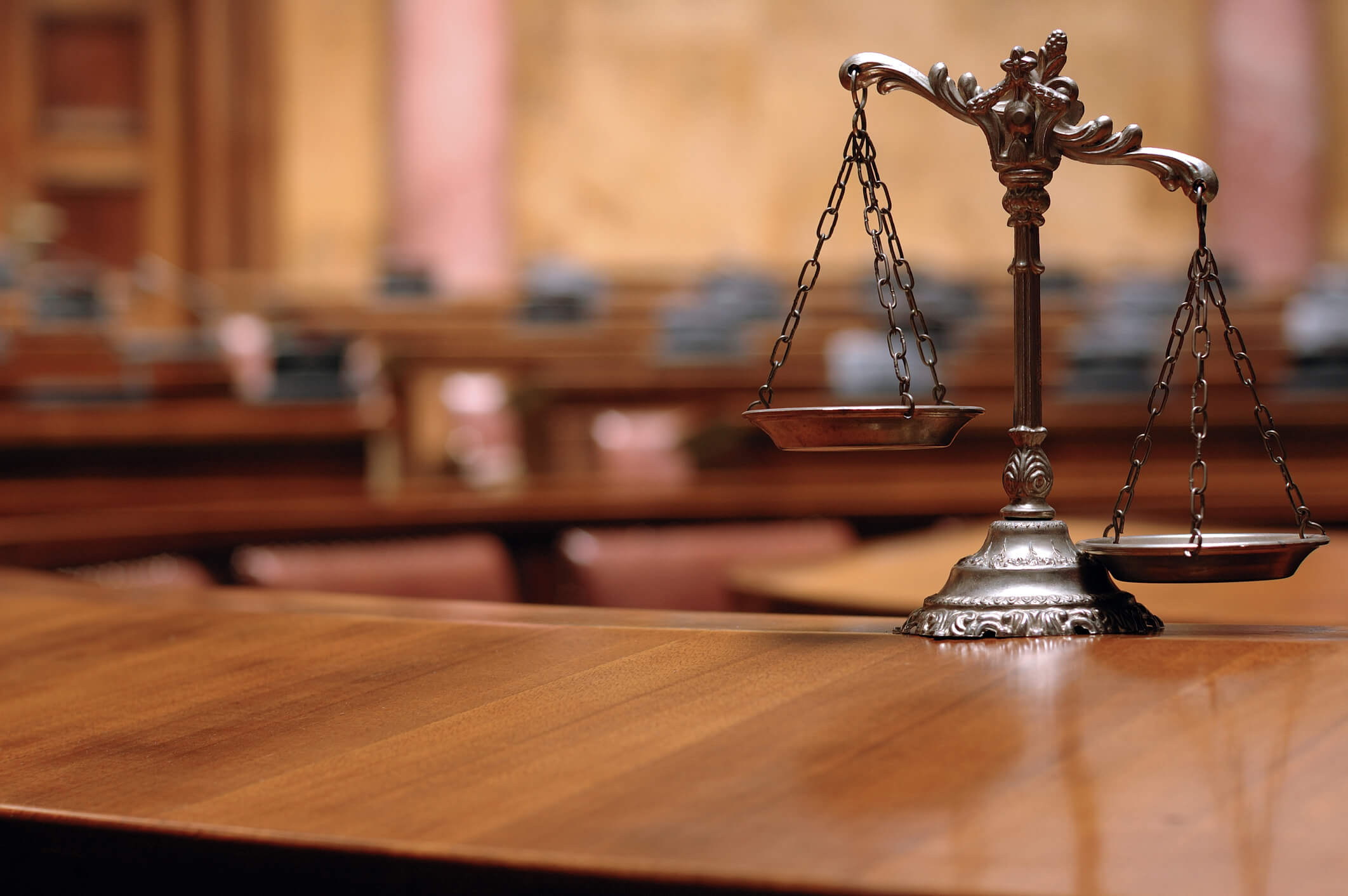 Decorative Scales of Justice in the Courtroom. Symbol of law and justice in the empty courtroom, law and justice concept.