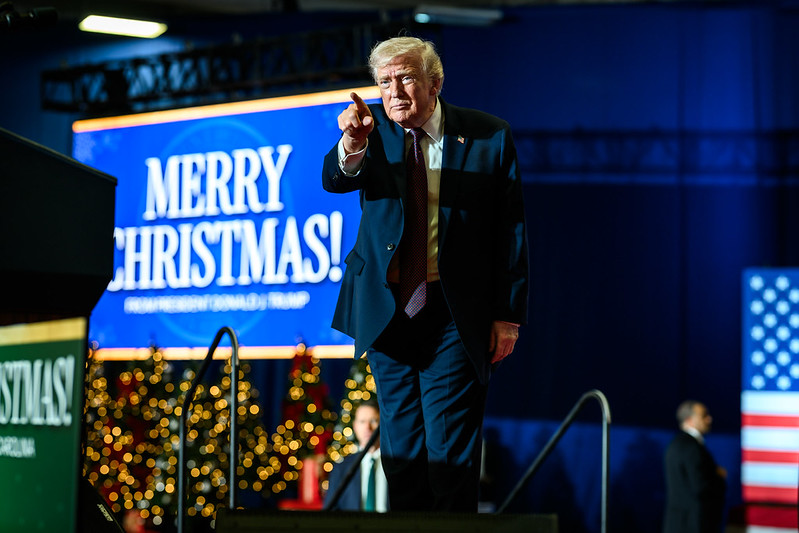 President Donald Trump gestures to the crowd after delivering remarks on the economy at the Rocky Mount Event Center in Rocky Mount, North Carolina on Friday, December 19, 2025.