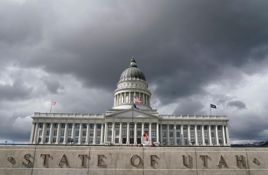 SALT LAKE CITY, UT - MAY 03: A women takes a picture at the Utah State Capitol where protesters show their support for Roe v. Wade and abortion on May 3, 2022 in Salt Lake City, Utah. A leaked draft opinion by Supreme Court Justice Samuel Alito has suggested that the Court is poised to overturn Roe v. Wade, the landmark 1973 ruling that created a constitutional right to abortion. (Photo by George Frey/Getty Images)