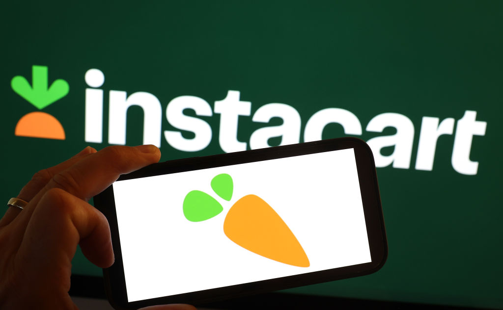 SAN ANSELMO, CALIFORNIA - AUGUST 28: In this photo illustration, the Instacart logo is displayed on a computer monitor on August 28, 2023 in San Anselmo, California. Grocery delivery company Instacart filed for its initial public offering on Friday with hopes to start trading on the Nasdaq by next month. (Photo Illustration by Justin Sullivan/Getty Images)