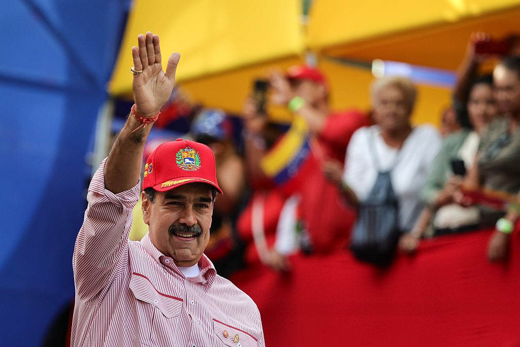 President Nicolas Maduro of Venezuela greets his supporters during a protest to support him on December 1, 2025 in Caracas, Venezuela.