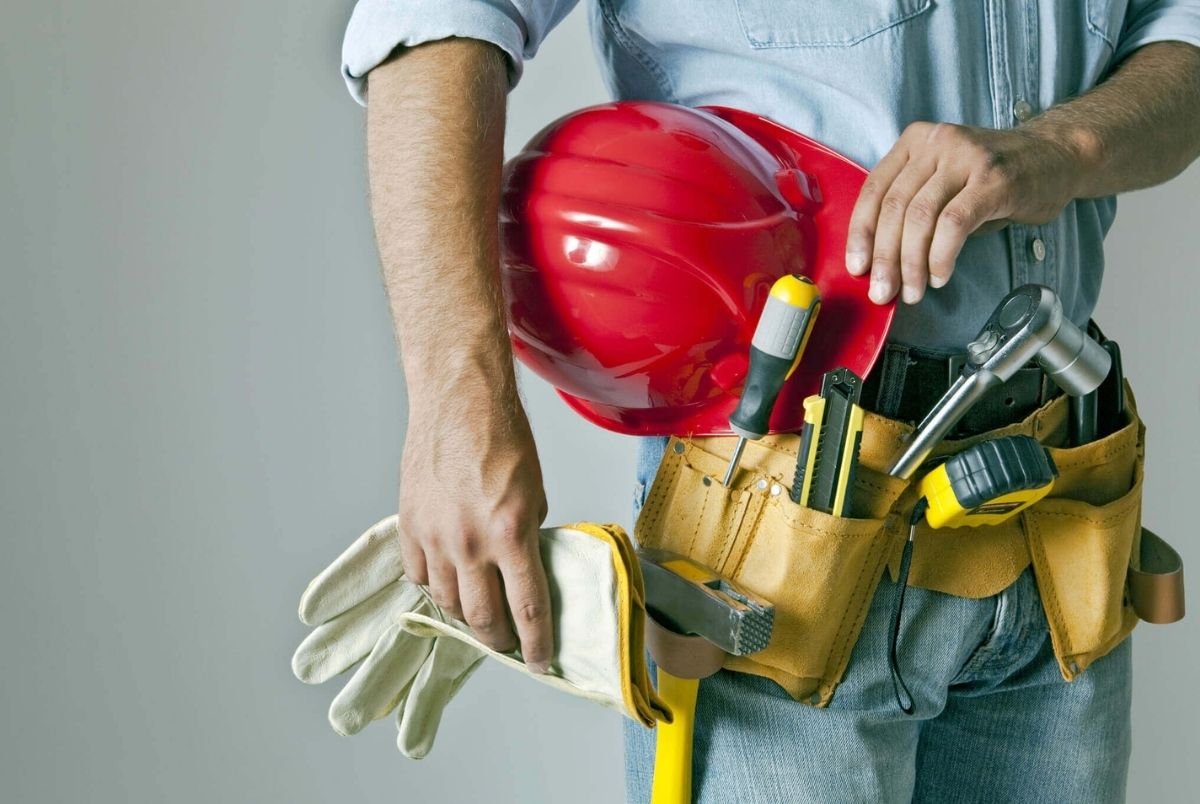 Construction Man. A construction worker with a tool belt
