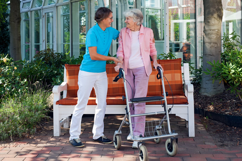 senior with caregiver