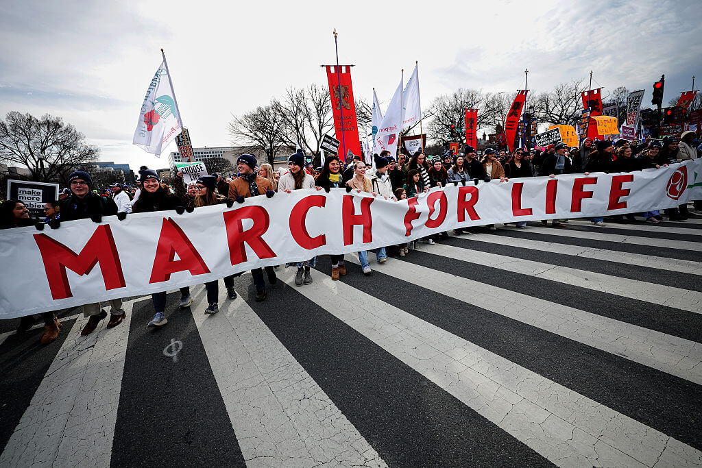 WASHINGTON, DC - JANUARY 23: People attend the annual March for Life rally on January 23, 2026 in Washington, DC. Anti-abortion activists gather every year to mark the anniversary of the Supreme Court's, now overturned, 1973, Roe v. Wade ruling which legalized abortion in all 50 states. (Photo by Kevin Dietsch/Getty Images)