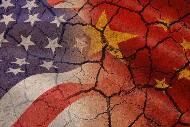 USA and China trade war economy recession conflict tax business finance money - Relations America and chinese flags cracked wall. USA and China trade war economy recession conflict tax business finance money / Relations America and chinese flags cracked wall background , selective focus