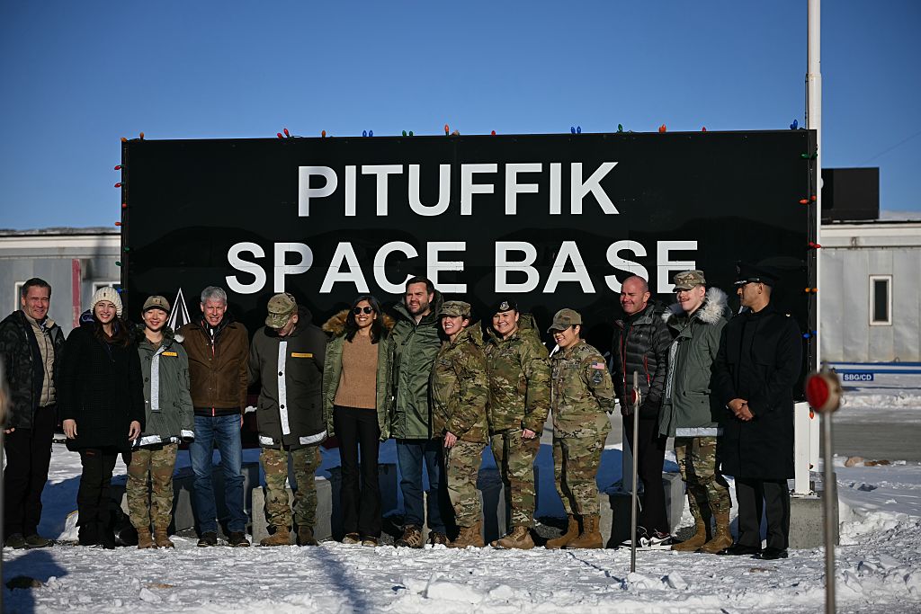 US Vice President JD Vance (C) and Second Lady Usha Vance (C L) pose with personnel at the US military's Pituffik Space Base on March 28, 2025 in Pituffik, Greenland.