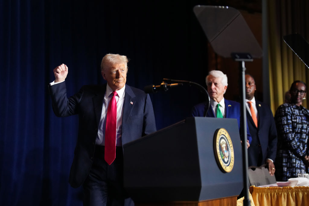 WASHINGTON, DC - FEBRUARY 06: U.S. President Donald Trump takes the podium at the National Prayer Breakfast sponsored by the The Fellowship Foundation at the Washington Hilton on February 06, 2025 in Washington, DC. The National Prayer Breakfast brings together members of Congress and leaders in fellowship and business for prayer and discussion. (Photo by Andrew Harnik/Getty Images)