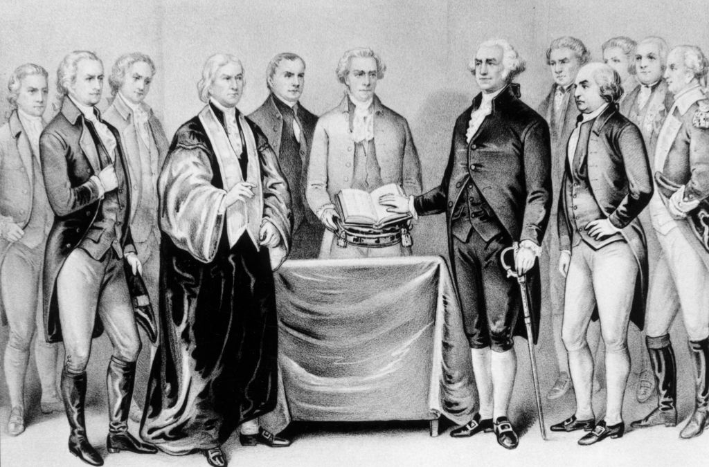 1788: The inauguration of George Washington as the first President of the United States, also present are (from left) Alexander Hamilton, Robert R Livingston, Roger Sherman, Mr Otis, Vice President John Adams, Baron Von Steuben and General Henry Knox. Original Artwork: Printed by Currier & Ives. (Photo by MPI/Getty Images)