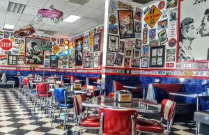 The interior of Legends Burgers, a retro-themed restaurant known for its '50s and '60s nostalgia.