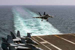 AT SEA, UNSPECIFIED - FEBRUARY 28: (EDITOR'S NOTE: This Handout image was provided by a third-party organization and may not adhere to Getty Images' editorial policy.) In this U.S. Navy released handout, An F/A-18E Super Hornet, attached to Strike Fighter Squadron (VFA) 14, makes an arrested landing on the flight deck of Nimitz-class aircraft carrier USS Abraham Lincoln (CVN 72) in support of Operation Epic Fury, on February 28, 2026 at Sea. Iran's Supreme Leader, Ayatollah Ali Khamenei, was confirmed killed after the United States and Israel launched a joint attack on Iran on February 28. Iran retaliated by firing waves of missiles and drones at Israel, and targeting U.S. allies in the region. (Photo by U.S. Navy via Getty Images)