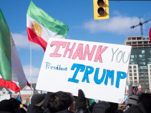 Sign Thanking President Trump for Attacking Islamic Regime in Iran at Toronto, Canada rally. A protester holds a sign that reads "Thank You President Trump" during a rally for a free Iran in Toronto following Operation Epic Fury on February 28, 2026.