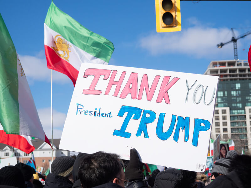 Sign Thanking President Trump for Attacking Islamic Regime in Iran at Toronto, Canada rally. A protester holds a sign that reads "Thank You President Trump" during a rally for a free Iran in Toronto following Operation Epic Fury on February 28, 2026.