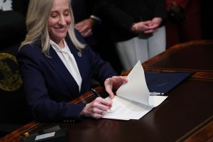 virginia gun control, spanberger at desk