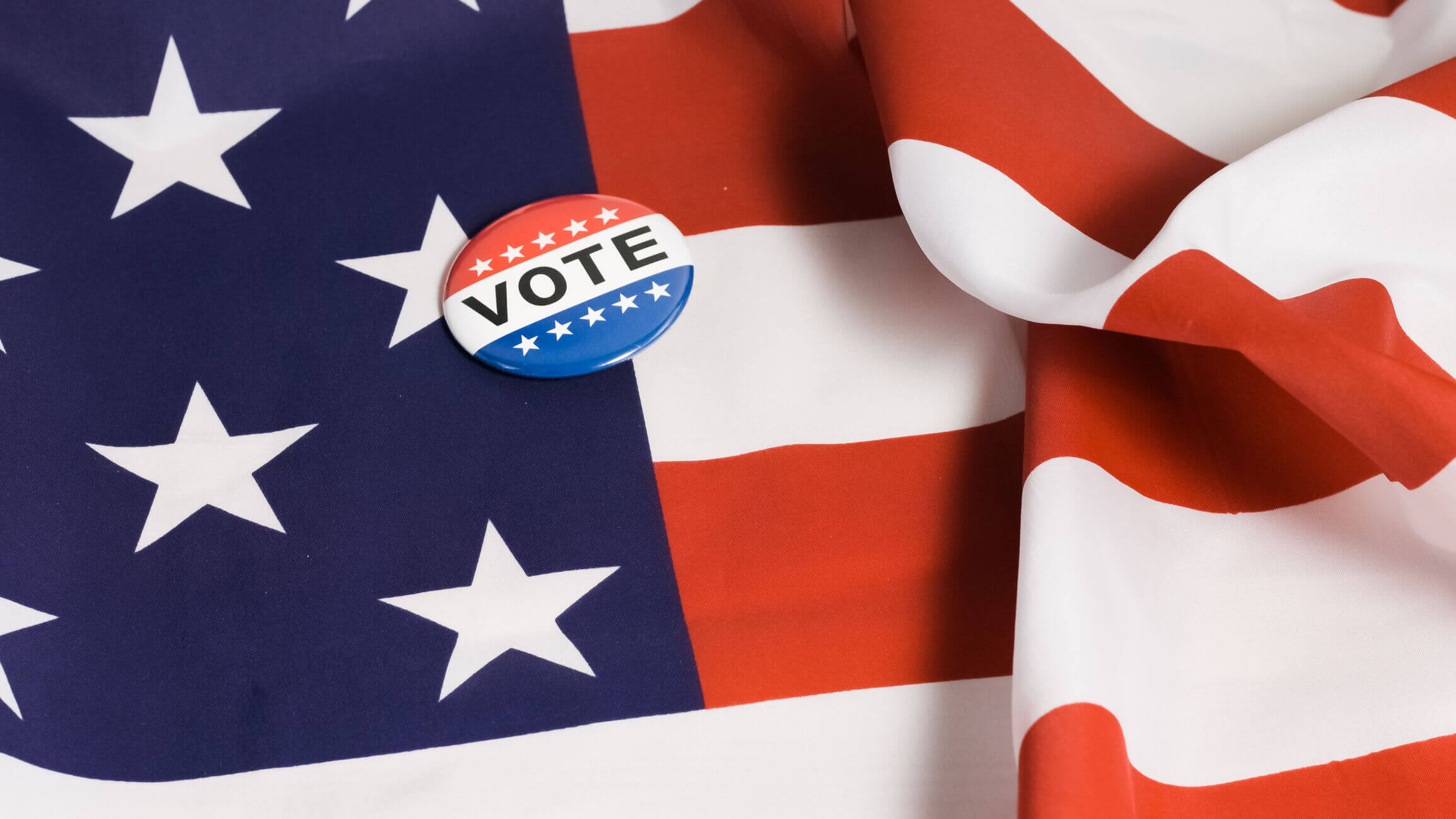 Button of I Voted on US flag. Button of I Voted for the US elections with american flag in background.