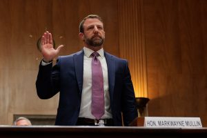 WASHINGTON, DC - MARCH 18: U.S. Sen. Markwayne Mullin (R-OK) is sworn in as he testifies during a confirmation hearing to be the next Secretary of the Department of Homeland Security in the Dirksen Senate Office Building on March 18, 2026 in Washington, DC. President Trump nominated Mullin to replace Kristi Noem as DHS Secretary. (Photo by Chip Somodevilla/Getty Images)