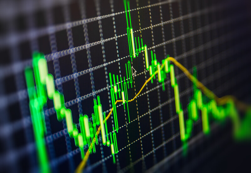 Display of Stock market quotes chart graph on monitor live online screen. Profit, capital growth and financial success concept. Stock market price digital display abstract. Modern virtual technology, illustration binary code on abstract technology background. Media gray and black image with graphs and icons. New modern computer and business strategy as concept. Financial diagram with candlestick chart used in market analysis for variation report of share price Stock market chart, graph on green background Shallow DOF effect