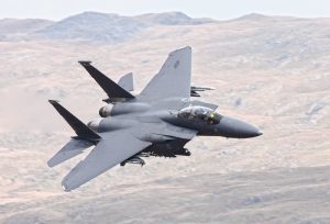 US Air Force F15 fighter jet. US Air Force USAF F15 fighter Eagle jet in low level training in LFA7, Wales, UK. March 26 2014.