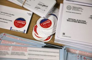 SAN JOSE, CALIFORNIA - OCTOBER 21: Election materials are displayed on a table at the Santa Clara County registrar of voters office on October 21, 2024 in San Jose, California. Early voting for the 2024 Presidential election began on October 7th in California. (Photo by Justin Sullivan/Getty Images)