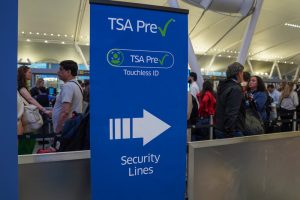 Travelers wait in a TSA Pre security line in Terminal 4 at John F Kennedy Airport in Queens, New York